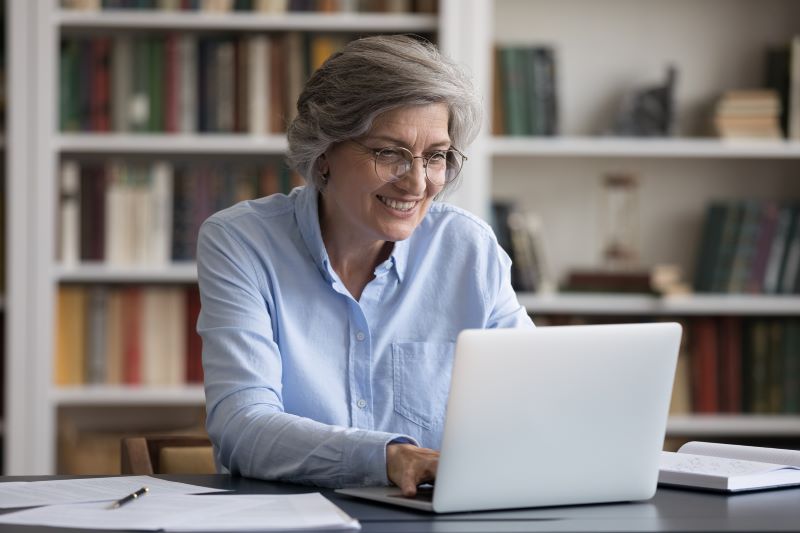 Woman Using Computer to Schedule an Online Appointment
