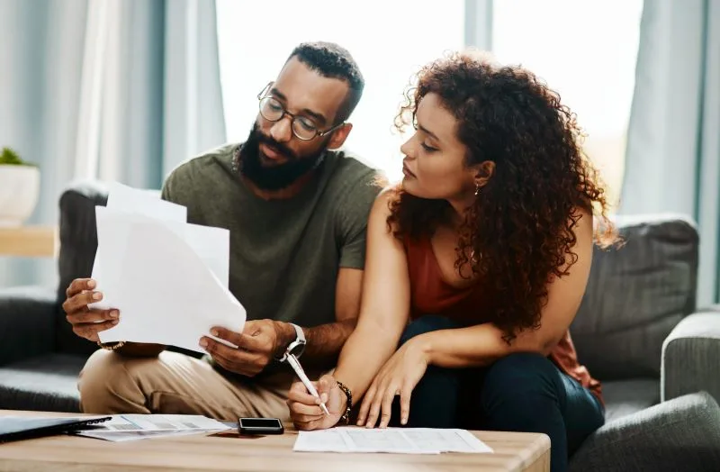 Married couple discussing Medi-Cal forms